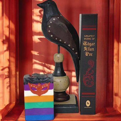 Masque of Red Death Poe collection soap with an Edgar Allan Poe book and wooden raven figurine