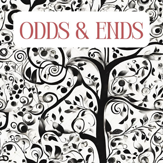 A whimsical black tree and ivy design with the words ODDS & ENDS on it